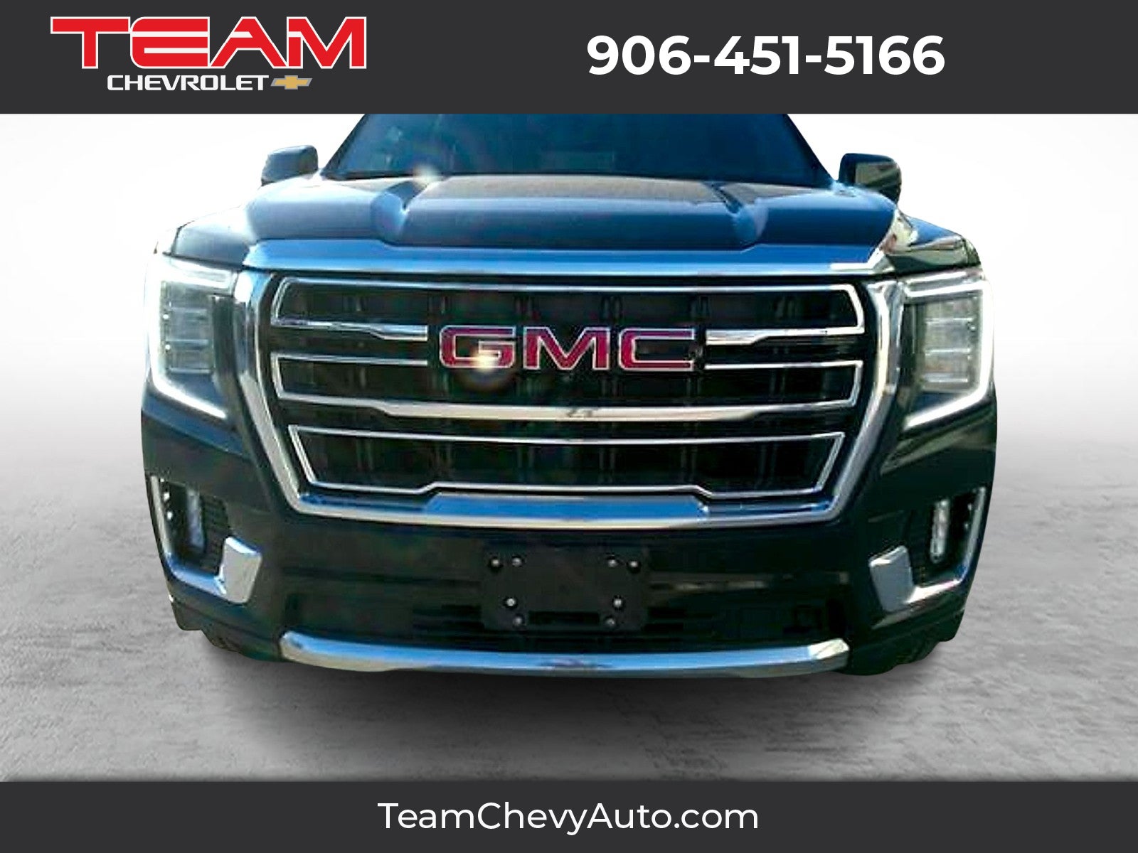2023 GMC Yukon SLT in Onyx Black — front three-quarter view