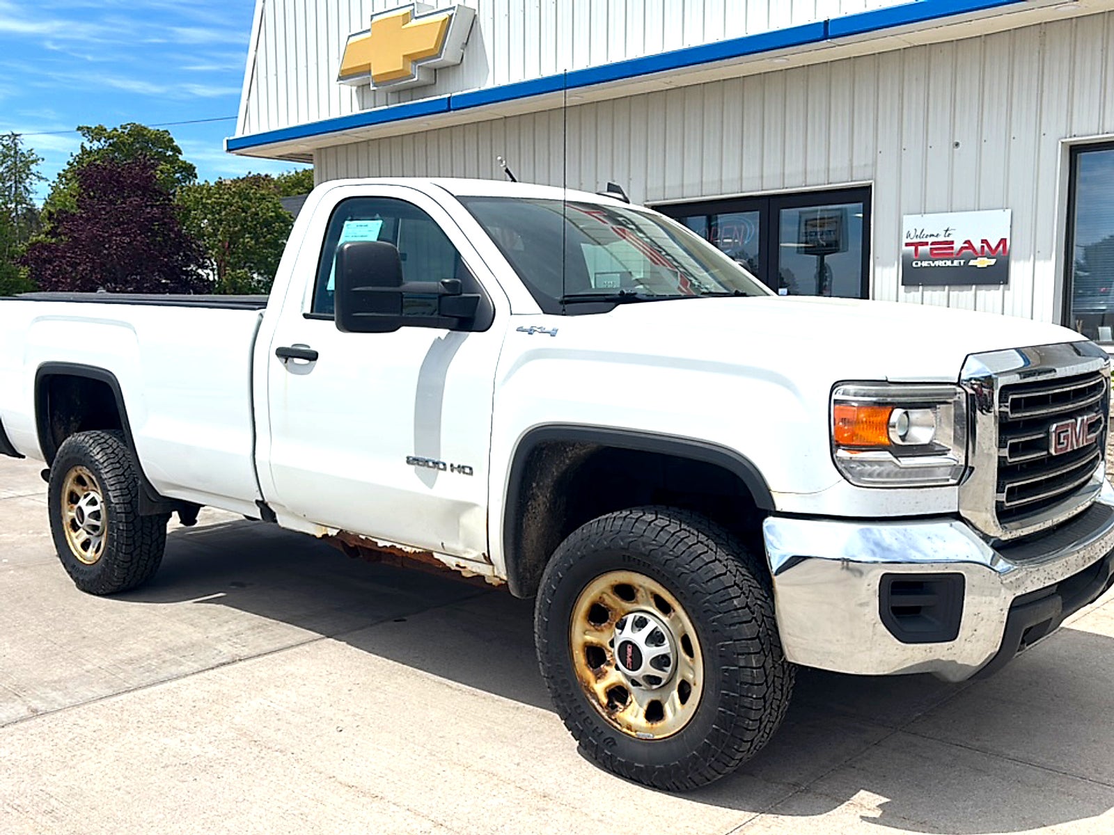 2016 GMC Sierra 2500 HD NA in Summit White — front three-quarter view