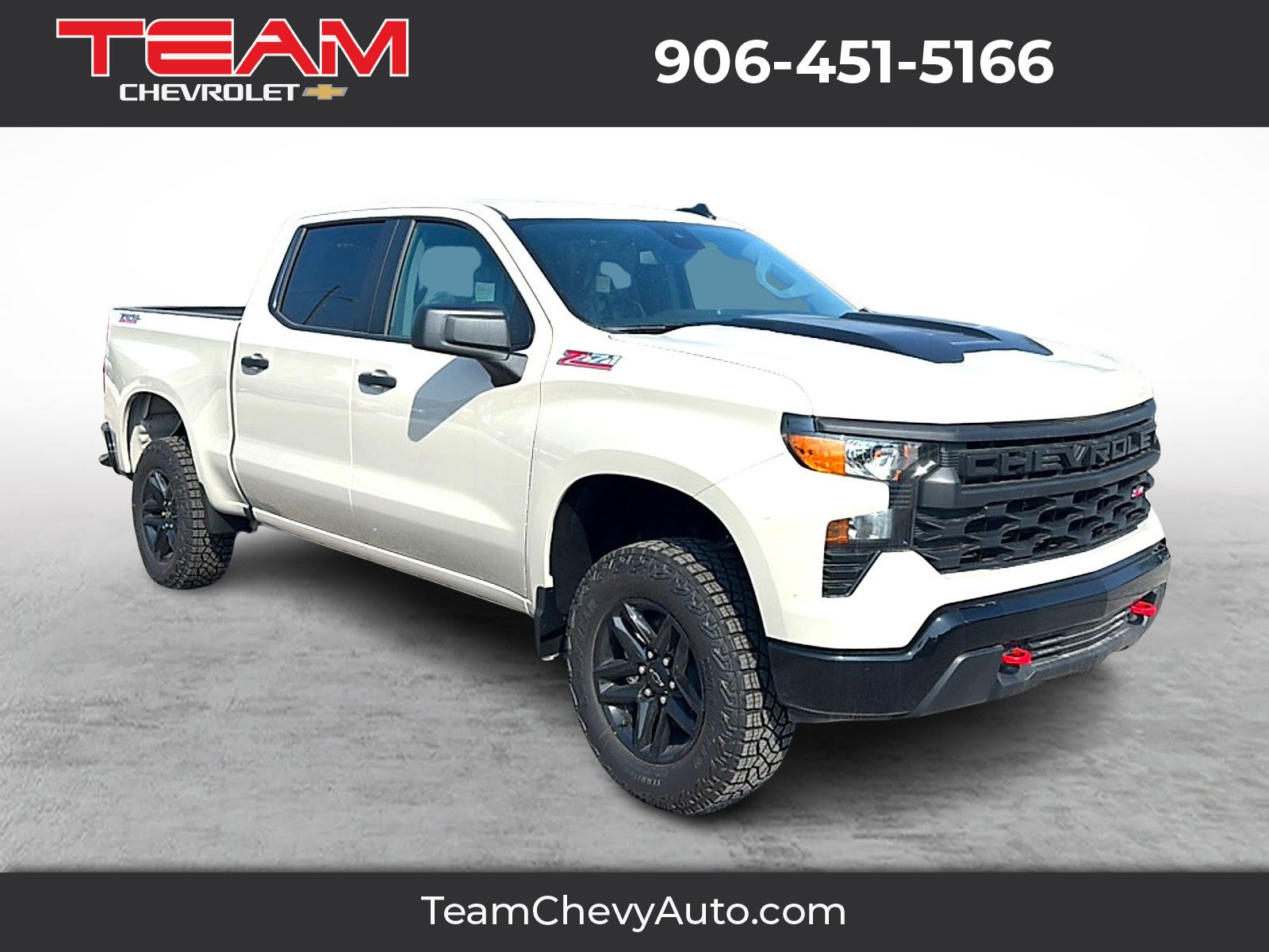 2026 Chevrolet Silverado 1500 Custom Trail Boss in White Sands — front three-quarter view